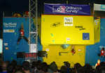 [The senior women's final at the BMC British Bouldering Championship at Cliffhanger, 4 kb]