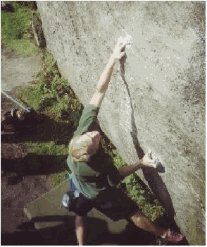 Slap - James Eldridge bouldering at Burbage South on Tiger (B6)