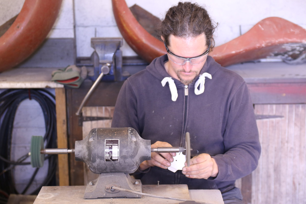 Photo: founder of Pongoose, Rob Rendall, in the workshop making the heads for the Pongoose Climber 700