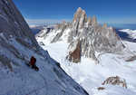 Will Sim making a calf burning traverse with the Fitz Roy massif in the distance, 4 kb