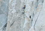 Alex Honnold following Hans Florine on their speed ascent of The Nose. Alex has loops of rope over his shoulder., 3 kb