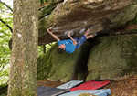 James Squire reaching for the lip on Jungle V.I.P (font 8a) at Burrator Resivour, Dartmoor., 4 kb