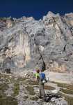 Calum Muskett under the 1155m. wall of Tempi Moderni, South Face of The Marmolada, Dolomites., 4 kb