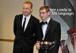Sir Chris Hoy presenting William with the Miquel Trophy, 3 kb