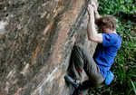 Ellis making the FA of Triple Trouble, an 8A link-up at Churlston Cove, 5 kb