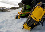 My friend putting crampons on for the first time. , 4 kb